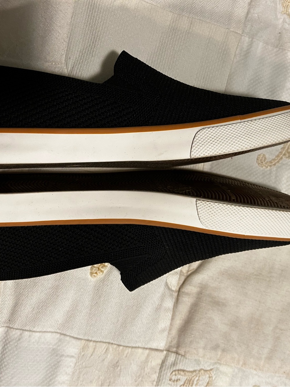 Tommy Bahama Black Knit Slip-On Flats with White Sole and Brown Trim
